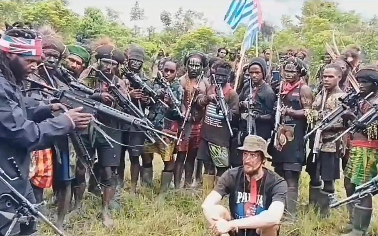 Separatist rebels free New Zealand pilot who's been held hostage for over a year in Papua, Indonesian authorities say