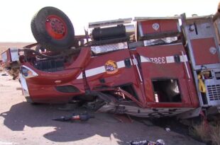 California firefighters remain hospitalized after truck flips over on freeway